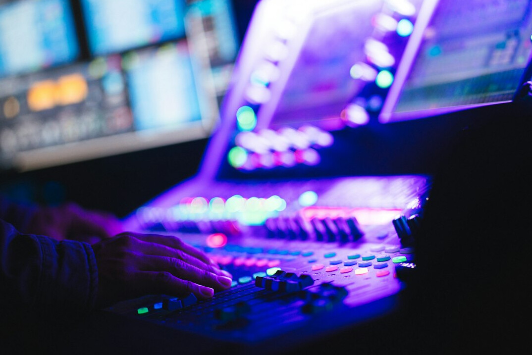 Television control room with monitors and director